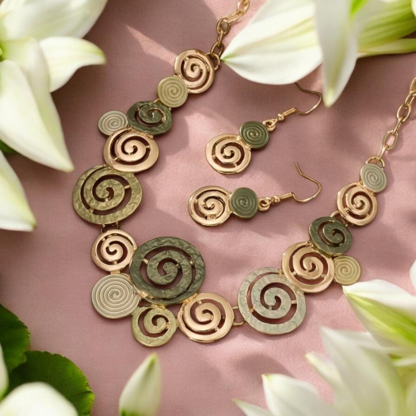 The necklace and earrings feature a graceful arrangement of alloy links finished in rich green tones, creating a striking balance between bold color and refined metallic sheen.