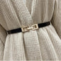 Black belt with gold decorative buckle