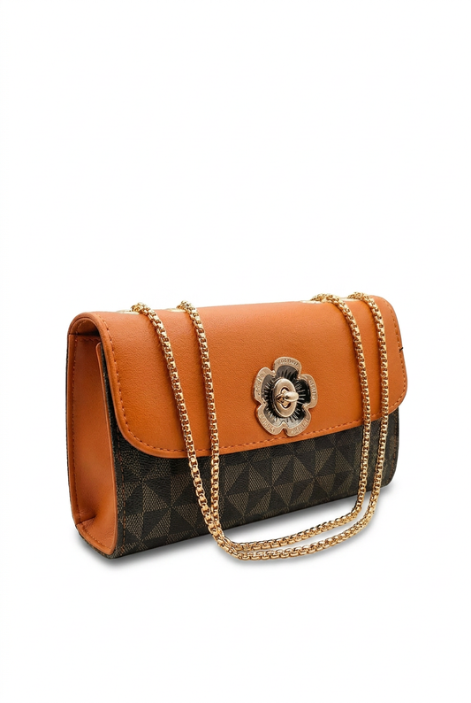 This chic ladies’ handbag in orange and brown is designed to make a statement. Featuring a refined gold shoulder strap and elegant gold detailing, it blends bold color with sophisticated accents.&nbsp;