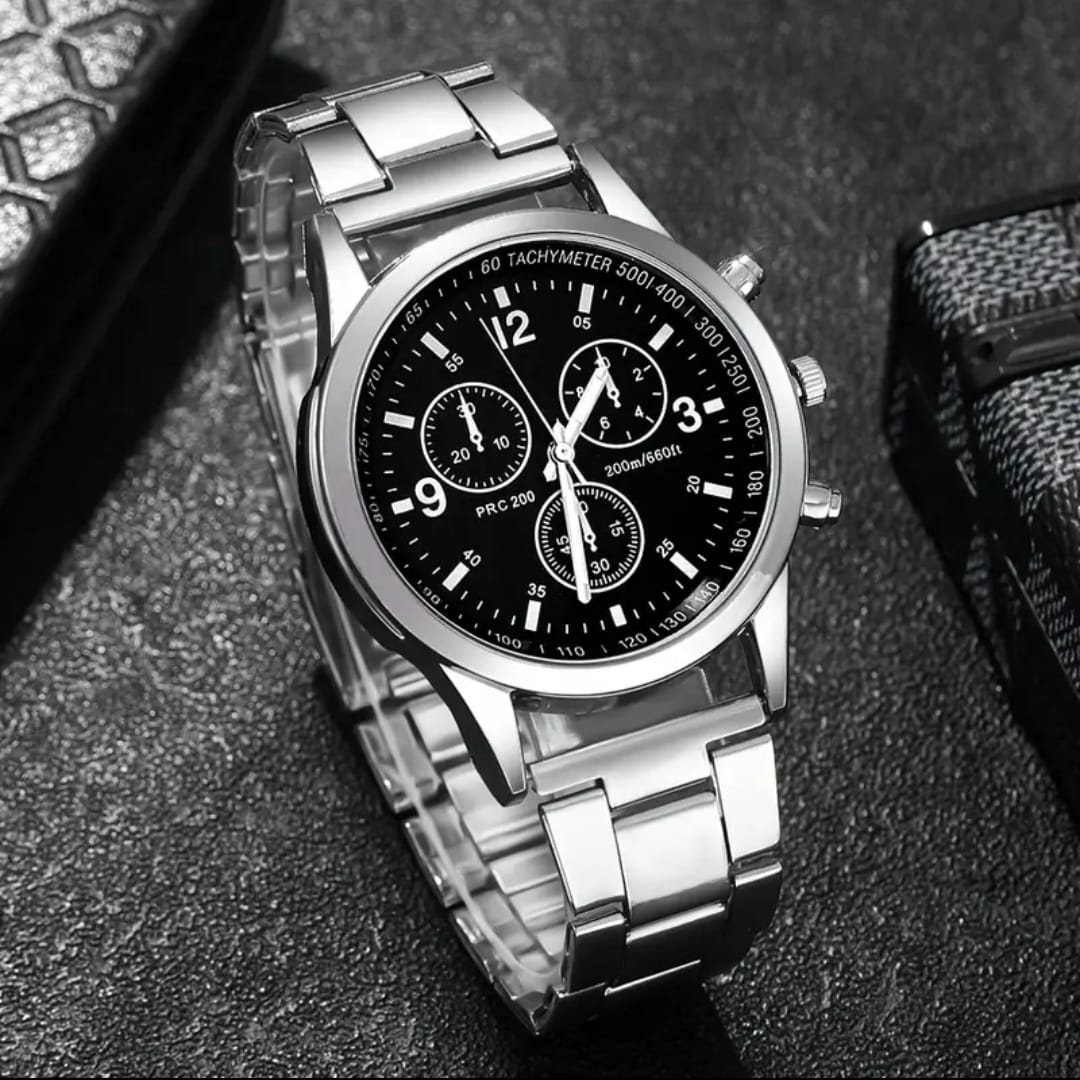 Timeless sophistication defines this classic gent’s watch, crafted with a sleek silver stainless steel band for durability and style. The design features a choice of either a bold black dial face or a crisp white dial face, allowing you to match your personal aesthetic. With a band length of 15cm, band width of 2cm, and a dial diameter of 4.2cm, it offers a balanced fit that’s both comfortable and striking. Powered by reliable quartz movement, this watch is the perfect accessory to elevate everyday wear or 