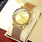  Ladies Gold quartz watch with a stainless-steel gold band