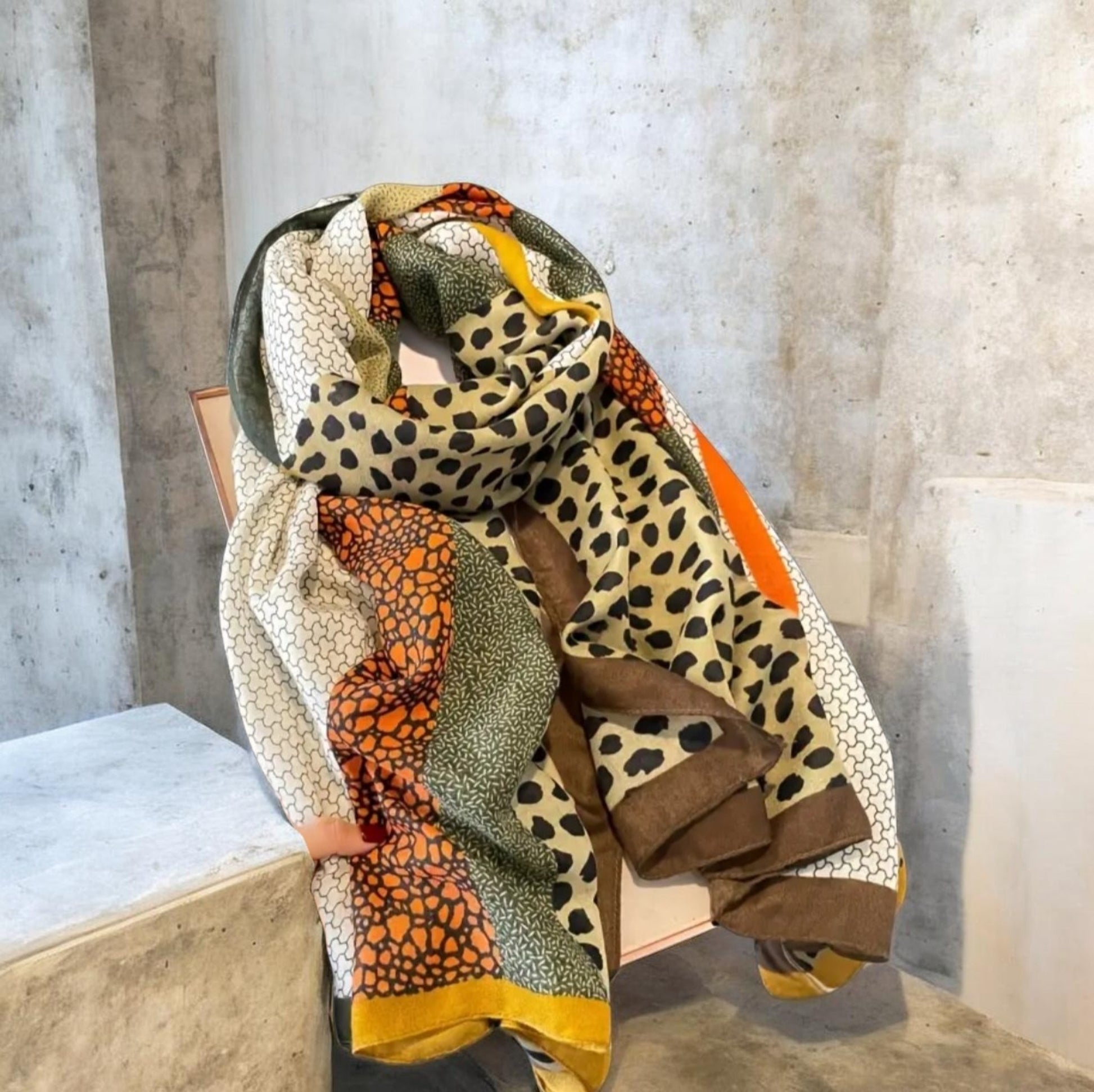 Colorful patterned scarf in earthy colors