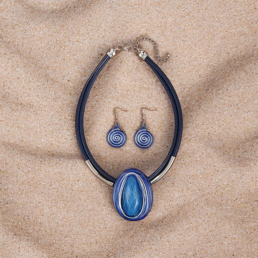 This stylish 2-piece set showcases artisanal craftsmanship with a striking blue resin stone centerpiece. Each stone is elegantly embossed with rope detailing, adding texture and sophistication to the design.