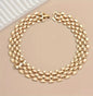 This golden hexagon hollow chain is the definition of edgy elegance. Crafted with bold, chunky links shaped into geometric hexagons, the necklace makes a powerful statement while maintaining a refined sophistication. 