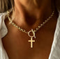 This striking necklace combines strength and elegance with a radiant gold-plated cross pendant crafted from durable stainless steel. Suspended from a classic cable chain, the design balances modern sophistication with timeless symbolism.