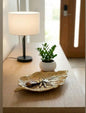 This beautifully crafted multipurpose leaf-shaped dish is available in gold. Made from Resin. Measuring 23 x13 cm