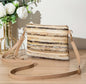 Multicolor woven handbag with leather strap in beige/brown undertones